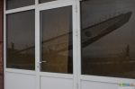 Лестница в Небо в Грозном в окне кафешки напротив. Шагает там женщина-миллиционер