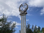 Горняцкая эмблема на въезде в город