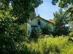 Заброшенное здание поселковой библиотеки